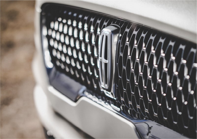 The grille of the 2023 Lincoln Aviator® Reserve model with an eye-catching repeated field of Lincoln Star logo shapes | White's Canyon Motors - Lincoln in Spearfish SD