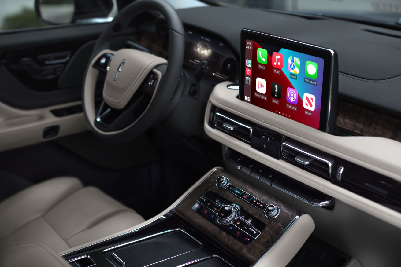 The interior of a Lincoln Aviator® SUV is shown with emphasis on the center touchscreen | White's Canyon Motors - Lincoln in Spearfish SD