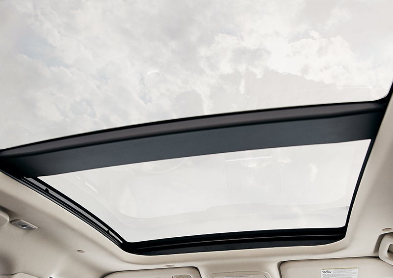 The available panoramic Vista Roof® is shown from inside a 2024 Lincoln Corsair® SUV. | White's Canyon Motors - Lincoln in Spearfish SD