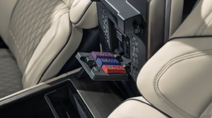 Digital Scent cartridges are shown in the diffuser located in the center arm rest. | White's Canyon Motors - Lincoln in Spearfish SD