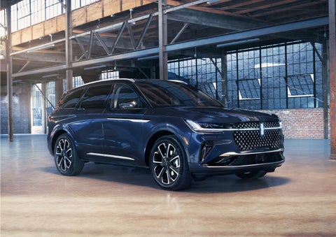 A 2024 Lincoln Nautilus® SUV is parked in an industrial space. | White's Canyon Motors - Lincoln in Spearfish SD