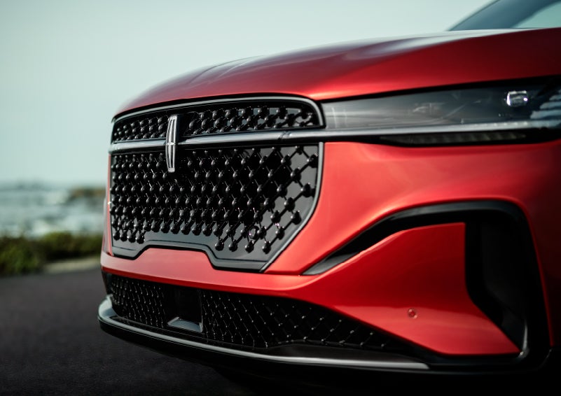 The sleek grille of a 2024 Lincoln Nautilus® SUV with the available Jet Appearance Package makes a bold statement. | White's Canyon Motors - Lincoln in Spearfish SD
