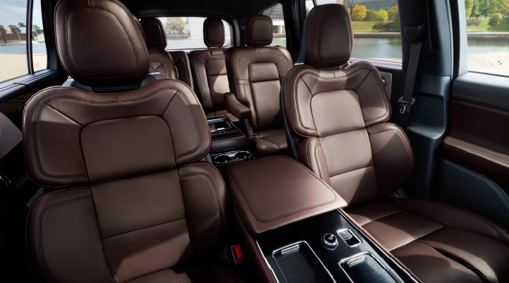 The cabin of the 2025 Lincoln Aviator® SUV is shown with black and brown accents. | White's Canyon Motors - Lincoln in Spearfish SD