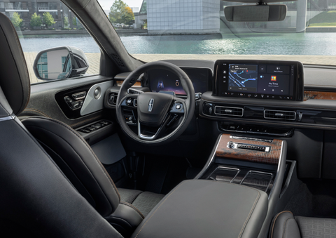 The interior of the 2025 Lincoln Aviator® SUV is shown parked with a view of a harbor through the windshield. | White's Canyon Motors - Lincoln in Spearfish SD