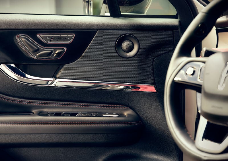 An audio speaker is shown in the driver's side door of a 2024 Lincoln Corsair® SUV. | White's Canyon Motors - Lincoln in Spearfish SD