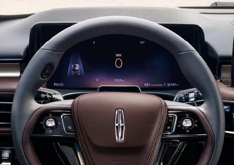 The driver’s information cluster display behind the steering wheel is shown. | White's Canyon Motors - Lincoln in Spearfish SD