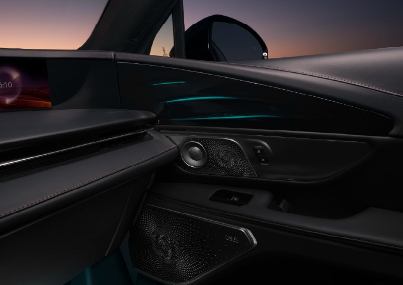 Selectable ambient lighting glows in the passenger door panel. | White's Canyon Motors - Lincoln in Spearfish SD