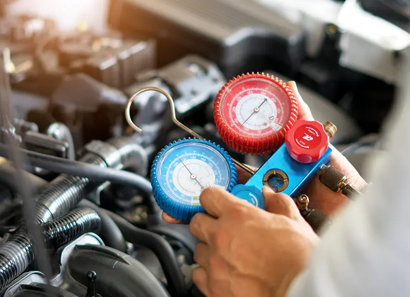 Checking car AC pressure with gauges